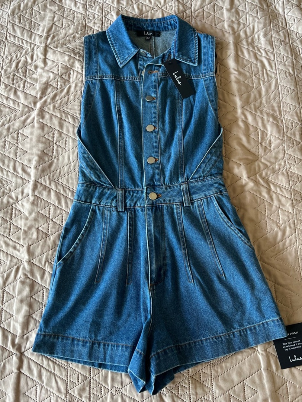 Lulu's Blue Denim Sleeveless Romper with Front Snap Closure
